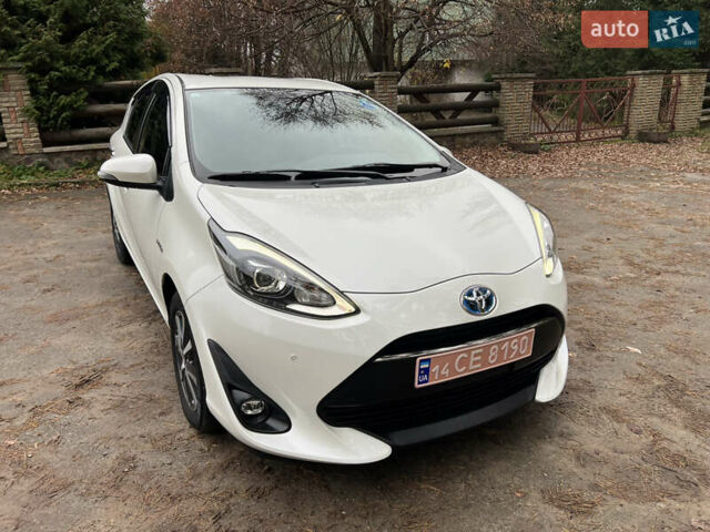 Білий Тойота Aqua, об'ємом двигуна 1.5 л та пробігом 61 тис. км за 13200 $, фото 4 на Automoto.ua