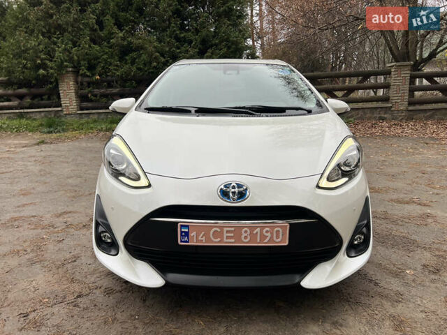 Білий Тойота Aqua, об'ємом двигуна 1.5 л та пробігом 61 тис. км за 13200 $, фото 3 на Automoto.ua