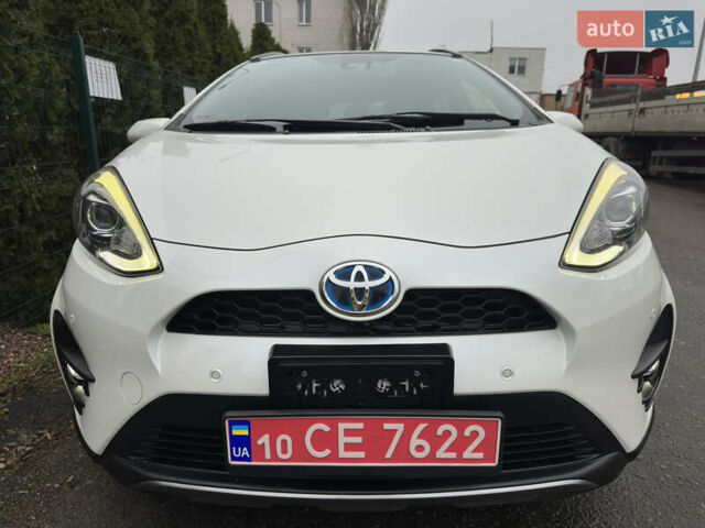 Белый Тойота Aqua, объемом двигателя 1.5 л и пробегом 79 тыс. км за 15950 $, фото 1 на Automoto.ua