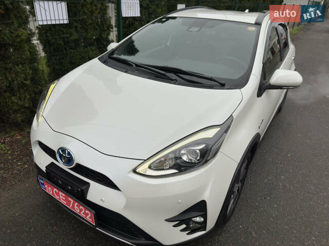 Белый Тойота Aqua, объемом двигателя 1.5 л и пробегом 79 тыс. км за 15950 $, фото 2 на Automoto.ua