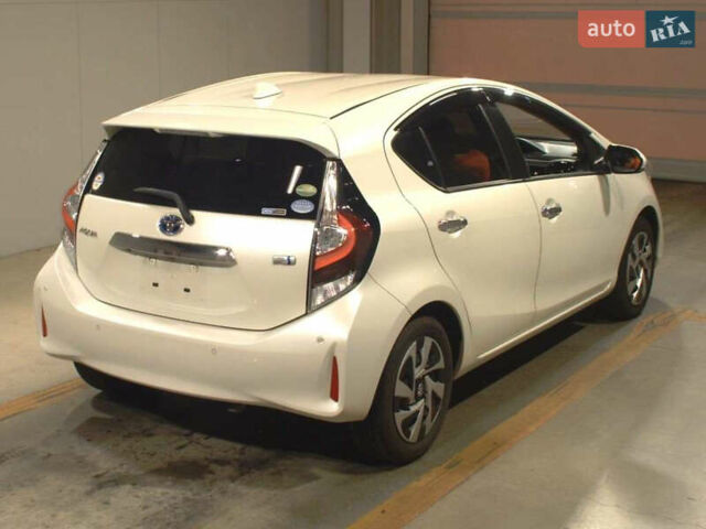 Белый Тойота Aqua, объемом двигателя 1.5 л и пробегом 83 тыс. км за 12500 $, фото 40 на Automoto.ua