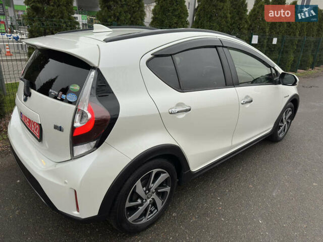 Белый Тойота Aqua, объемом двигателя 1.5 л и пробегом 79 тыс. км за 15950 $, фото 22 на Automoto.ua