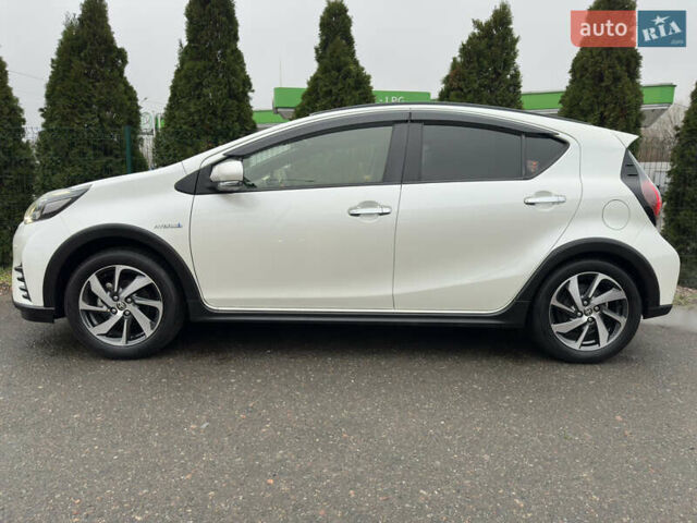 Белый Тойота Aqua, объемом двигателя 1.5 л и пробегом 79 тыс. км за 15950 $, фото 3 на Automoto.ua