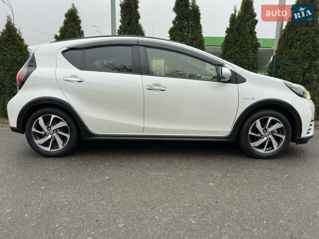 Белый Тойота Aqua, объемом двигателя 1.5 л и пробегом 79 тыс. км за 15950 $, фото 23 на Automoto.ua