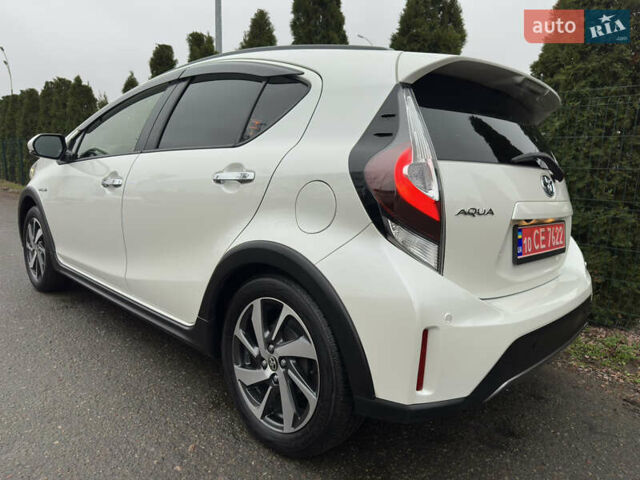 Белый Тойота Aqua, объемом двигателя 1.5 л и пробегом 79 тыс. км за 15950 $, фото 7 на Automoto.ua