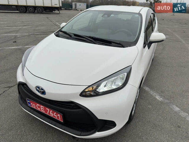 Білий Тойота Aqua, об'ємом двигуна 1.5 л та пробігом 58 тис. км за 17900 $, фото 5 на Automoto.ua