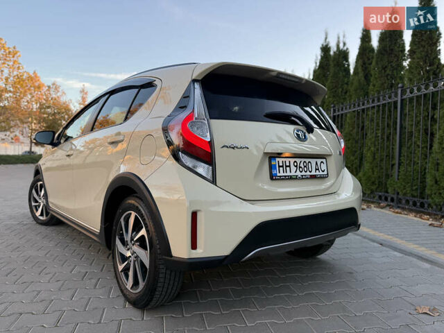 Бежевий Тойота Aqua, об'ємом двигуна 1.5 л та пробігом 79 тис. км за 13900 $, фото 54 на Automoto.ua