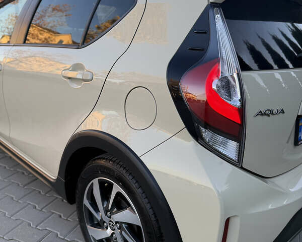 Бежевий Тойота Aqua, об'ємом двигуна 1.5 л та пробігом 79 тис. км за 13900 $, фото 26 на Automoto.ua