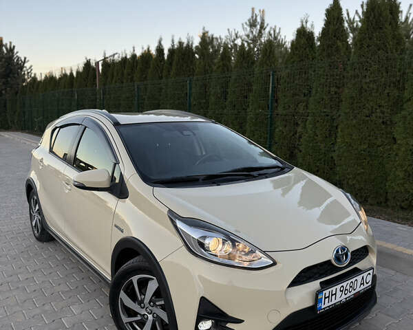 Бежевий Тойота Aqua, об'ємом двигуна 1.5 л та пробігом 79 тис. км за 13900 $, фото 5 на Automoto.ua