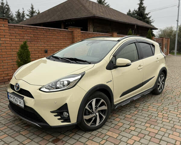 Бежевый Тойота Aqua, объемом двигателя 1.5 л и пробегом 90 тыс. км за 13700 $, фото 11 на Automoto.ua