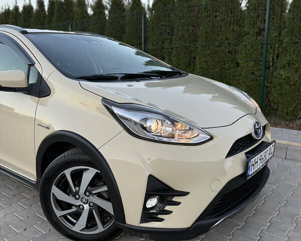 Бежевий Тойота Aqua, об'ємом двигуна 1.5 л та пробігом 79 тис. км за 13900 $, фото 6 на Automoto.ua