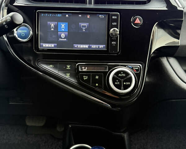 Бежевый Тойота Aqua, объемом двигателя 1.5 л и пробегом 90 тыс. км за 13700 $, фото 33 на Automoto.ua