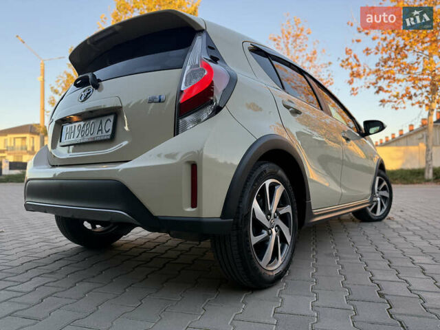 Бежевий Тойота Aqua, об'ємом двигуна 1.5 л та пробігом 79 тис. км за 13900 $, фото 14 на Automoto.ua