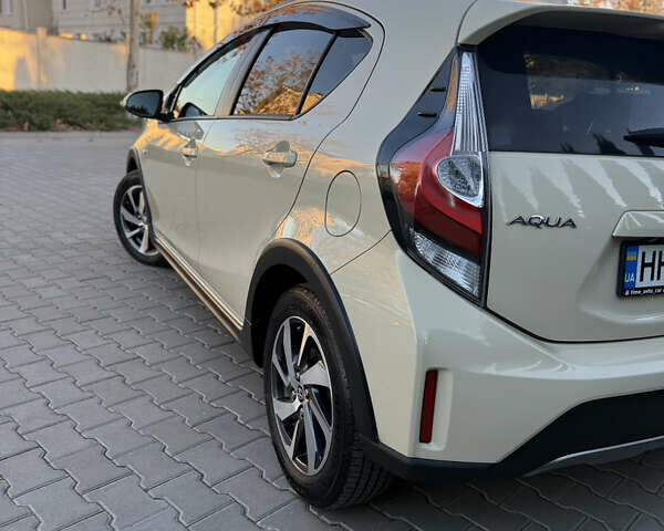 Бежевий Тойота Aqua, об'ємом двигуна 1.5 л та пробігом 79 тис. км за 13900 $, фото 24 на Automoto.ua