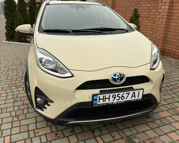 Бежевый Тойота Aqua, объемом двигателя 1.5 л и пробегом 90 тыс. км за 13700 $, фото 16 на Automoto.ua