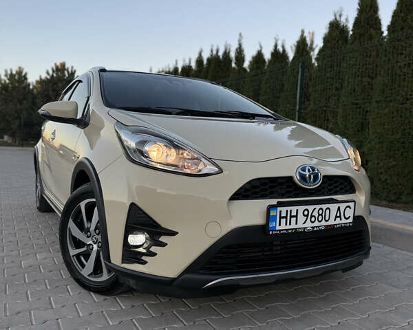 Бежевий Тойота Aqua, об'ємом двигуна 1.5 л та пробігом 79 тис. км за 13900 $, фото 57 на Automoto.ua