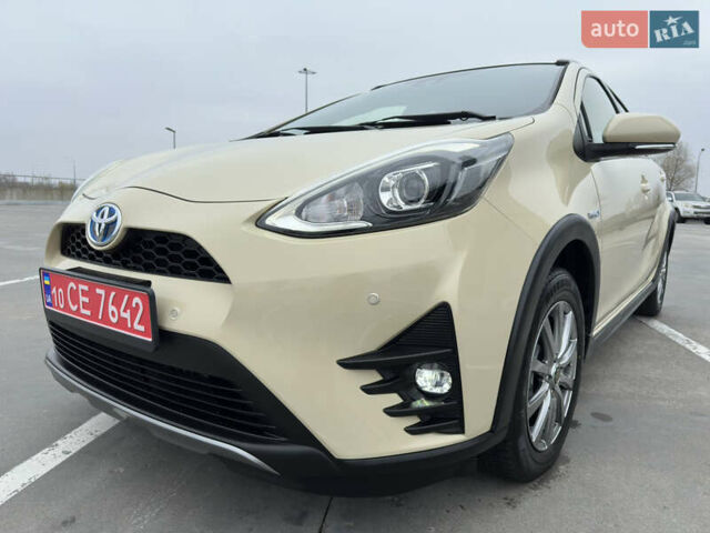 Бежевий Тойота Aqua, об'ємом двигуна 1.5 л та пробігом 72 тис. км за 14950 $, фото 1 на Automoto.ua