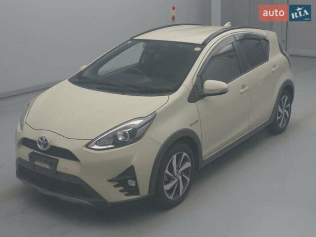 Бежевый Тойота Aqua, объемом двигателя 1.5 л и пробегом 73 тыс. км за 12900 $, фото 8 на Automoto.ua