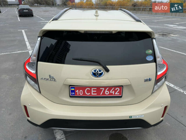 Бежевий Тойота Aqua, об'ємом двигуна 1.5 л та пробігом 72 тис. км за 14950 $, фото 17 на Automoto.ua