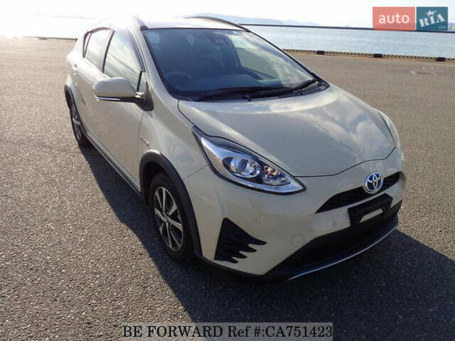 Бежевый Тойота Aqua, объемом двигателя 1.5 л и пробегом 89 тыс. км за 13500 $, фото 6 на Automoto.ua