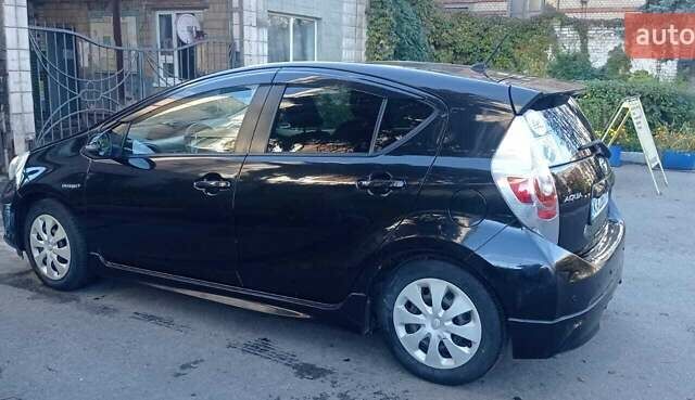 Черный Тойота Aqua, объемом двигателя 1.5 л и пробегом 181 тыс. км за 9400 $, фото 4 на Automoto.ua