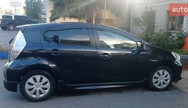 Черный Тойота Aqua, объемом двигателя 1.5 л и пробегом 181 тыс. км за 9400 $, фото 3 на Automoto.ua