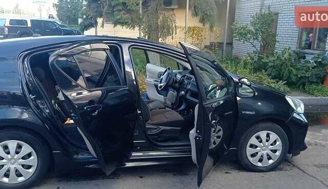 Черный Тойота Aqua, объемом двигателя 1.5 л и пробегом 181 тыс. км за 9400 $, фото 6 на Automoto.ua