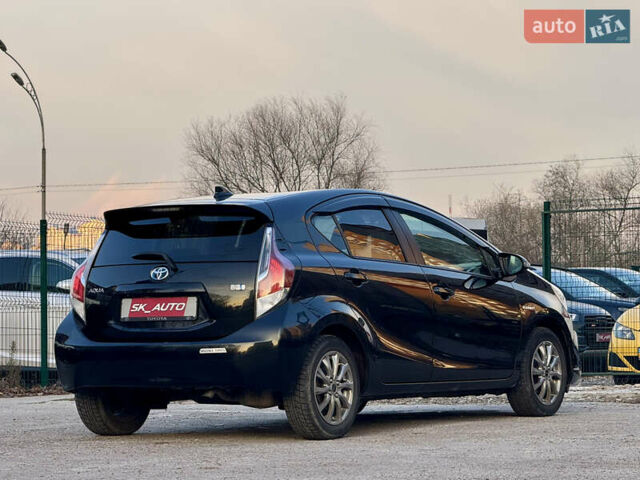 Черный Тойота Aqua, объемом двигателя 1.5 л и пробегом 138 тыс. км за 10900 $, фото 56 на Automoto.ua