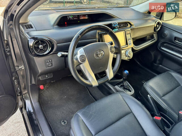 Черный Тойота Aqua, объемом двигателя 1.5 л и пробегом 138 тыс. км за 10900 $, фото 25 на Automoto.ua