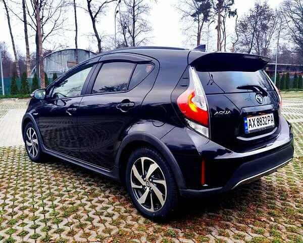 Черный Тойота Aqua, объемом двигателя 1.5 л и пробегом 67 тыс. км за 13900 $, фото 5 на Automoto.ua