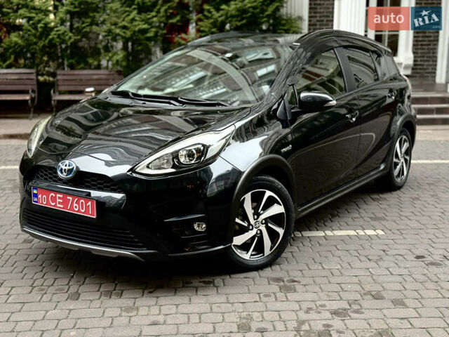 Черный Тойота Aqua, объемом двигателя 1.5 л и пробегом 52 тыс. км за 13500 $, фото 1 на Automoto.ua