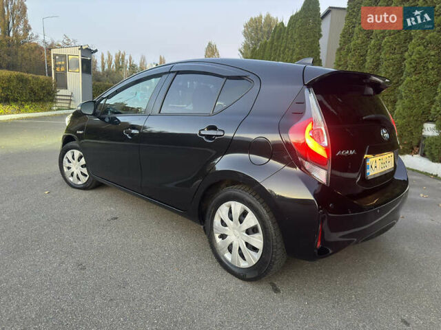 Черный Тойота Aqua, объемом двигателя 1.5 л и пробегом 135 тыс. км за 12800 $, фото 3 на Automoto.ua