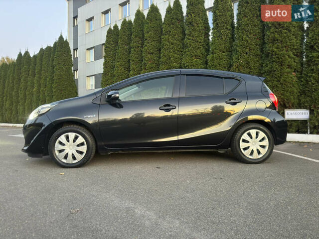 Черный Тойота Aqua, объемом двигателя 1.5 л и пробегом 135 тыс. км за 12800 $, фото 4 на Automoto.ua