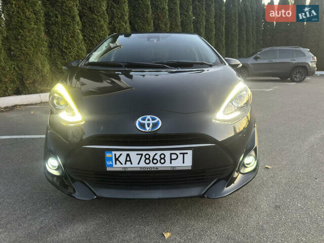 Черный Тойота Aqua, объемом двигателя 1.5 л и пробегом 135 тыс. км за 12800 $, фото 2 на Automoto.ua