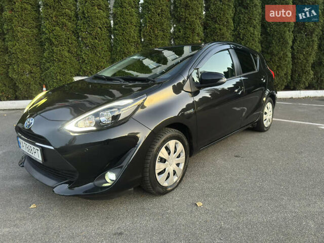 Черный Тойота Aqua, объемом двигателя 1.5 л и пробегом 135 тыс. км за 12800 $, фото 1 на Automoto.ua