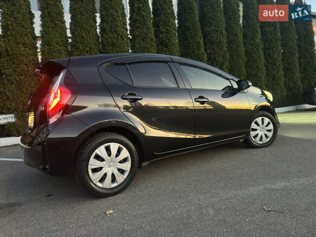 Черный Тойота Aqua, объемом двигателя 1.5 л и пробегом 135 тыс. км за 12800 $, фото 8 на Automoto.ua