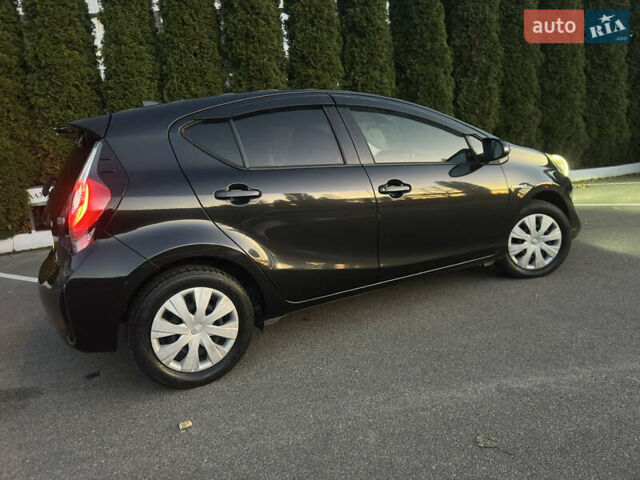 Черный Тойота Aqua, объемом двигателя 1.5 л и пробегом 135 тыс. км за 12800 $, фото 9 на Automoto.ua