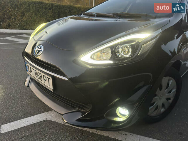 Черный Тойота Aqua, объемом двигателя 1.5 л и пробегом 135 тыс. км за 12800 $, фото 10 на Automoto.ua