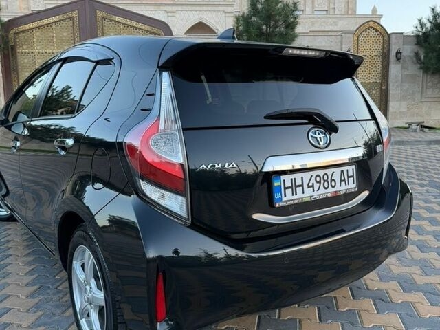 Чорний Тойота Aqua, об'ємом двигуна 1.5 л та пробігом 67 тис. км за 13300 $, фото 6 на Automoto.ua