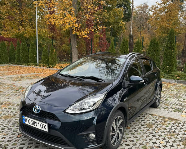 Черный Тойота Aqua, объемом двигателя 1.5 л и пробегом 63 тыс. км за 14200 $, фото 1 на Automoto.ua