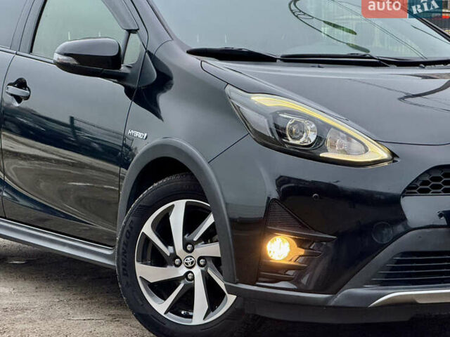 Чорний Тойота Aqua, об'ємом двигуна 1.5 л та пробігом 74 тис. км за 13999 $, фото 51 на Automoto.ua