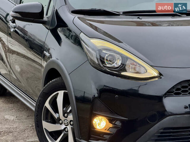 Чорний Тойота Aqua, об'ємом двигуна 1.5 л та пробігом 74 тис. км за 13999 $, фото 53 на Automoto.ua