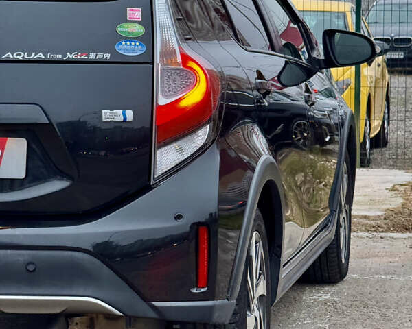 Чорний Тойота Aqua, об'ємом двигуна 1.5 л та пробігом 74 тис. км за 13999 $, фото 61 на Automoto.ua