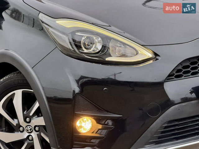 Чорний Тойота Aqua, об'ємом двигуна 1.5 л та пробігом 74 тис. км за 13999 $, фото 54 на Automoto.ua
