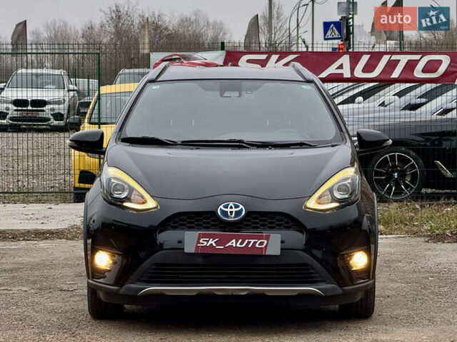 Чорний Тойота Aqua, об'ємом двигуна 1.5 л та пробігом 74 тис. км за 13999 $, фото 1 на Automoto.ua