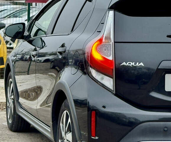 Чорний Тойота Aqua, об'ємом двигуна 1.5 л та пробігом 74 тис. км за 13999 $, фото 66 на Automoto.ua