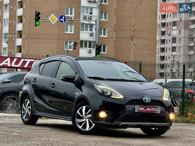 Чорний Тойота Aqua, об'ємом двигуна 1.5 л та пробігом 74 тис. км за 13999 $, фото 2 на Automoto.ua