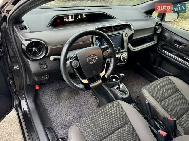 Чорний Тойота Aqua, об'ємом двигуна 1.5 л та пробігом 74 тис. км за 13999 $, фото 25 на Automoto.ua