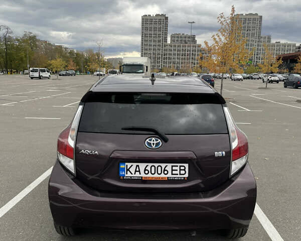 Фиолетовый Тойота Aqua, объемом двигателя 1.5 л и пробегом 83 тыс. км за 11900 $, фото 3 на Automoto.ua