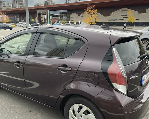 Фиолетовый Тойота Aqua, объемом двигателя 1.5 л и пробегом 83 тыс. км за 11900 $, фото 2 на Automoto.ua